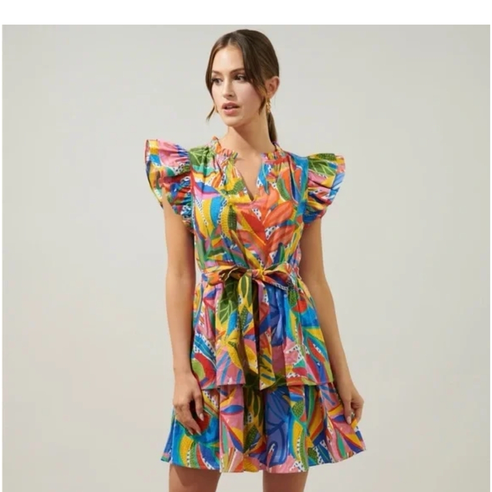This is a Sugarlips Marisol Tiered Mini Dress in the "New Guinea" print. 